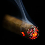 burning-cigar-black-background-37153465.jpg